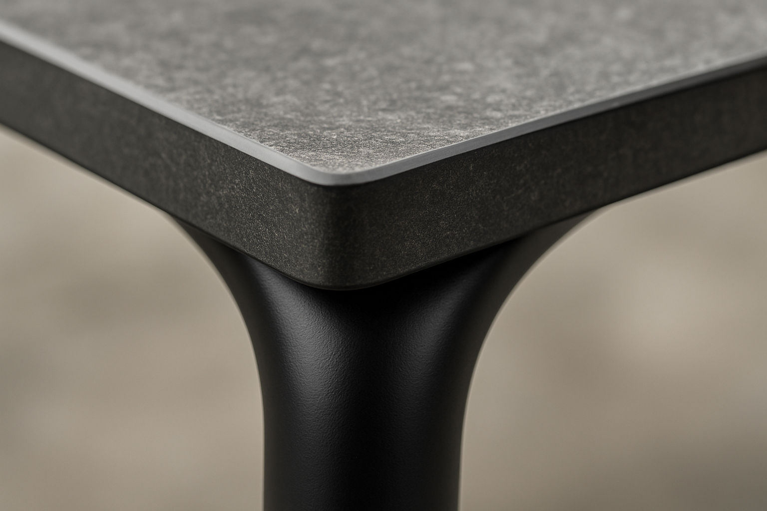 close-up shot of a powder-coated aluminum table base and a weather-resistant HPL top