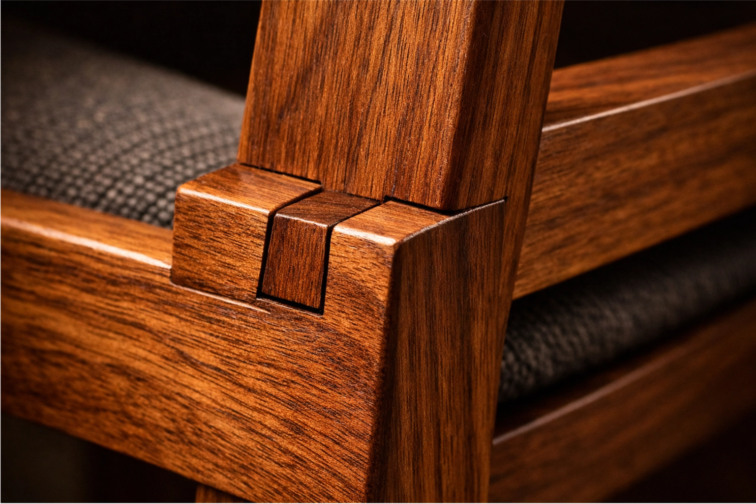 A close-up image showing the strong, interlocking wood joinery on a high-quality dining chair