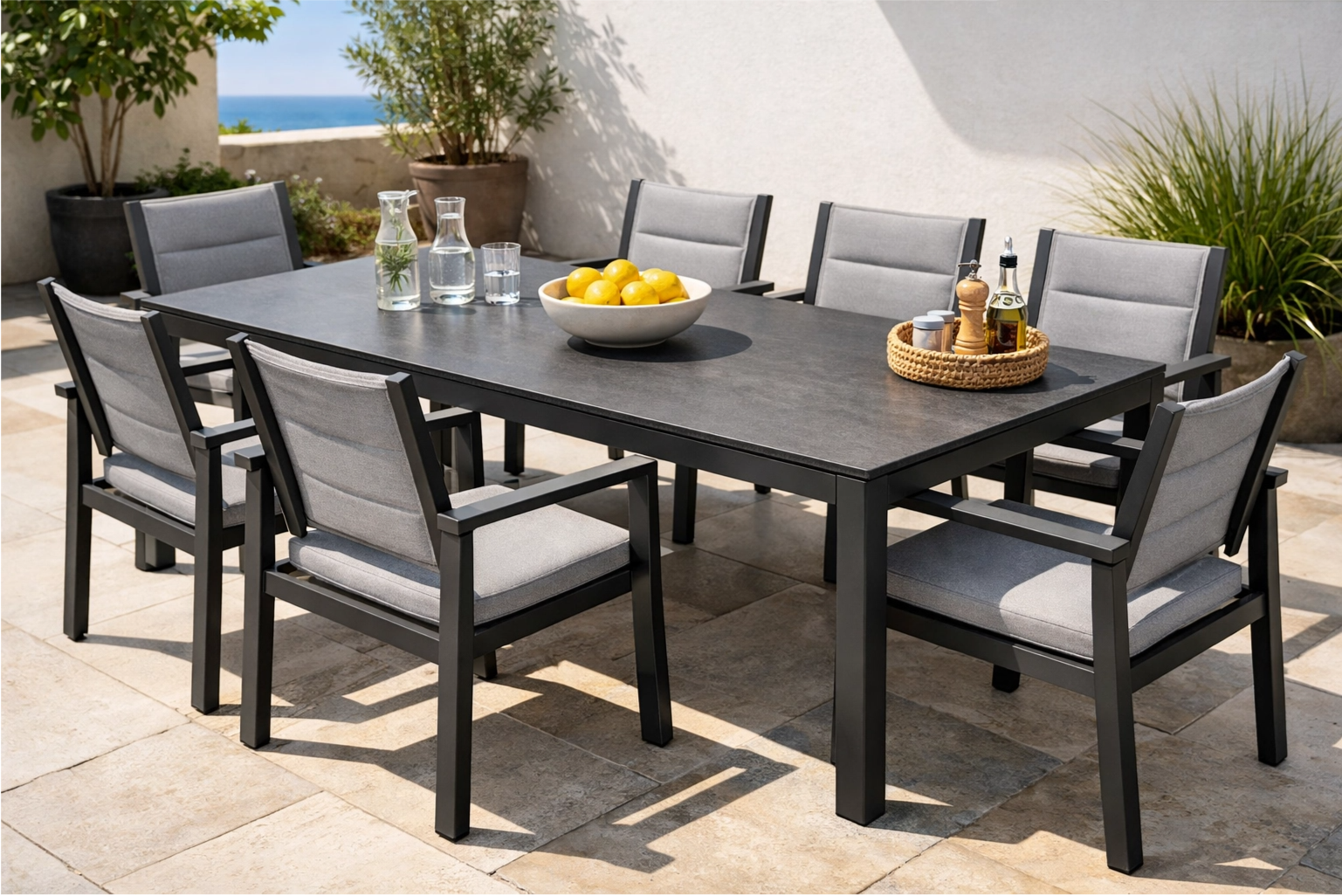 a modern, weather-resistant outdoor dining table on a sunlit patio